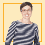 Light yellow background with image of Fiona Barrett wearing stripey long-sleeved and glasses, and smiling at the camera.