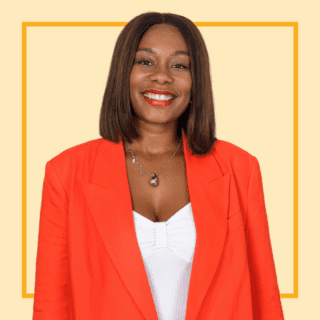 Light yellow background with Angelica Simpson wearing a bright orange blazer and white vest, smiling at the camera