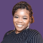 Profile picture of Azaria O'Dame, smiling and wearing a striped top.