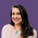 Profile picture of Sarah Walsh, smiling and wearing a pink top with blue necklace.