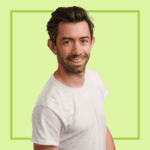 Light green background with image of Alex Preston, wearing a white t-shirt, smiling at the camera.