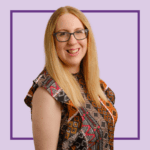 Light purple background with image of Zoe Farmer, wearing a black and red patterned t-shirt and glasses, smiling at the camera.