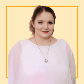 Light yellow background with image of Stephanie Bates, smiling at the camera wearing a white blouse.