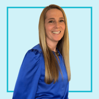 Light blue background with image of Clare Mottram wearing a blue blouse, smiling at the camera.